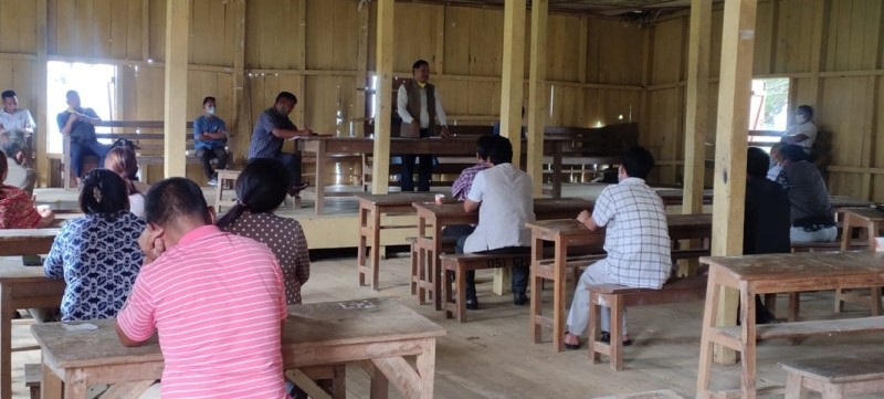 Advisor Namri Nchang, legislator incharge of Peren district for COVID-19 addressing a meeting at GHS Auditorium, Tening on July 3. (DIPR Photo) 